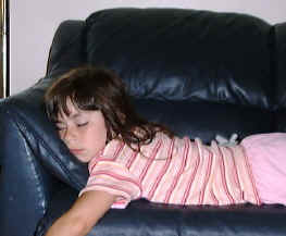 caitlin_sleeping_couch.jpg (137192 bytes)